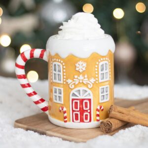 Candy cane gingerbread house mug with festive Christmas design, perfect for seasonal drinks and holiday decor.