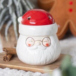 Santa Claus shaped oil burner and wax warmer for Christmas home decor.