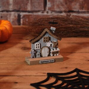 Wooden Halloween haunted house block ornament with ghost, skeleton, bat, tombstone, BEWARE sign and Nightmare Nook label in grey, brown and white, measuring 10.5 x 4.3 x 10 cm.