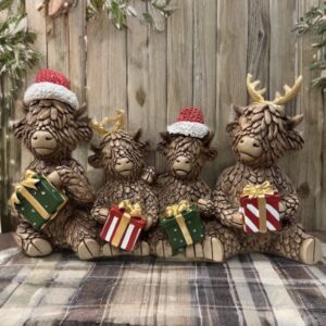 Festive Highland Cow Family Holding Gifts