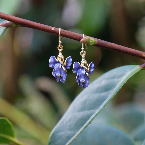 Gold plated iris drop hook earrings with hand-finished blue enamel flower design, elegant botanical jewellery with hypoallergenic hooks, ideal for pairing with the matching Gold Plated Iris Pendant Necklace.