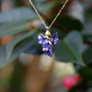 Gold plated iris pendant necklace with hand-finished blue enamel flower, botanical jewellery inspired by the iris, elegant floral pendant on an adjustable chain, ideal for pairing with matching Iris earrings.