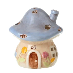 Large blue ceramic mushroom house ornament with fairy cottage design, blue mushroom roof and floral details, woodland decor piece, ideal for pairing with smaller pink ceramic mushroom ornament
