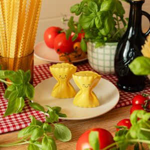 Sass & Belle pasta farfalle salt and pepper shakers shaped like bow tie pasta, playful kitchen tableware set, ideal for pairing with tomato mug and tomato planter for coordinated foodie kitchen decor.