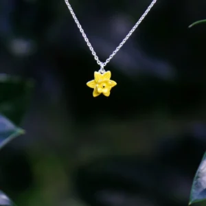 Silver plated daffodil flower pendant necklace with hand-finished yellow enamel petals and trumpet, botanical jewellery inspired by spring, ideal for pairing with the matching Silver Plated Daffodil Stud Earrings.