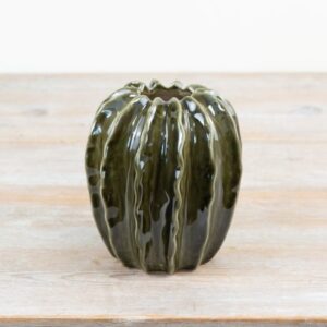 Glazed ceramic pod-shaped vase in emerald green, ideal for modern home décor and displaying fresh or dried flowers.