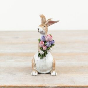 Rustic bunny holding flowers ornament featuring a standing rabbit with a colourful tulip bouquet in pink and purple, ideal for Easter and spring decor.
