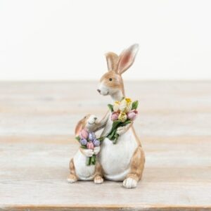 Mum and baby rabbit ornament holding colourful tulip flowers in pink and purple, ideal for Easter and spring home decor displays.