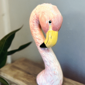 Pink ceramic flamingo vase with textured feather detail for tropical home decor