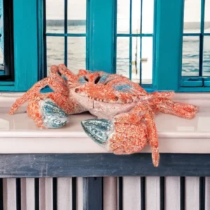 Hand-painted resin coral crab ornament featuring intricate red, blue, and grey coral formations, designed as a coastal nautical home décor sculpture measuring 28cm.