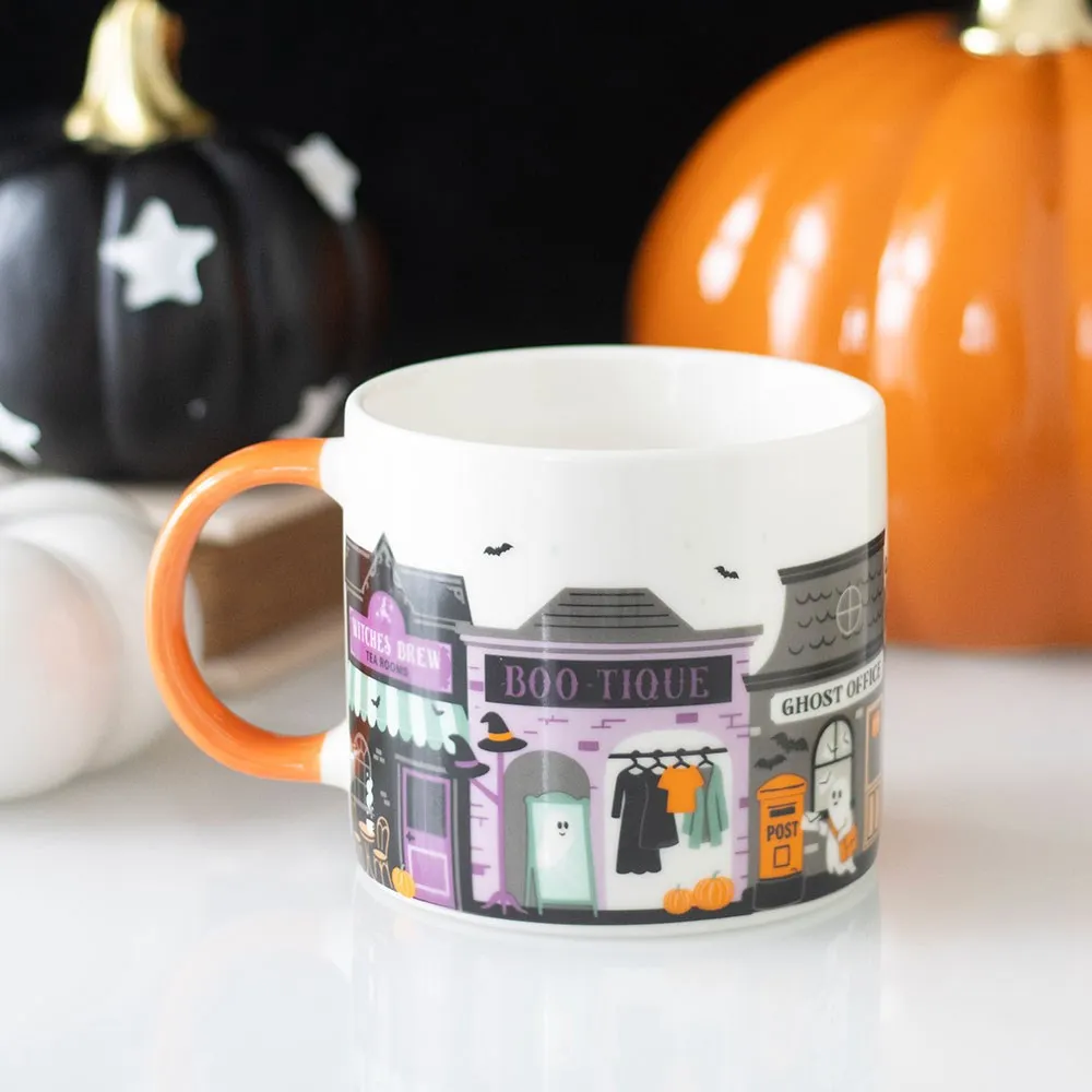 Spooky Street Halloween mug with Boo-tique, Ghost Office and Witches’ Brew design