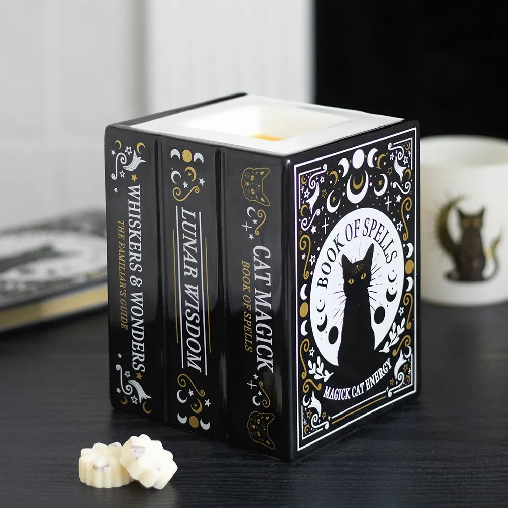 Black Cat Book of Spells oil burner and wax warmer with stacked spell books
