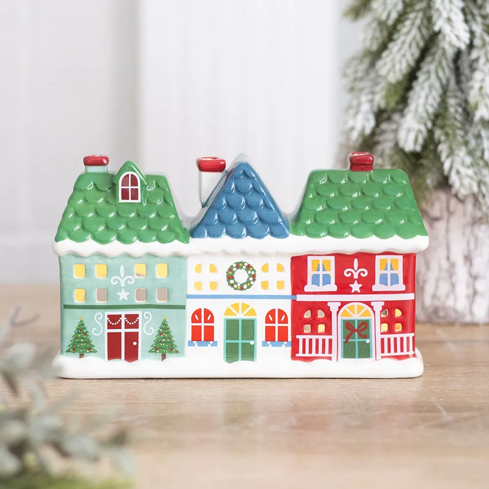 Christmas Street ceramic tealight and incense cone holder featuring a charming trio of festive houses. Perfect for cosy Christmas décor and home fragrance displays.