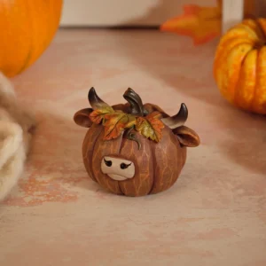 Resin Highland cow head ornament with leaf detail