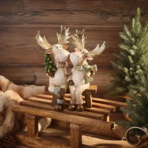 Nordic Nest resin moose couple Christmas ornament sitting on bench with gold antlers