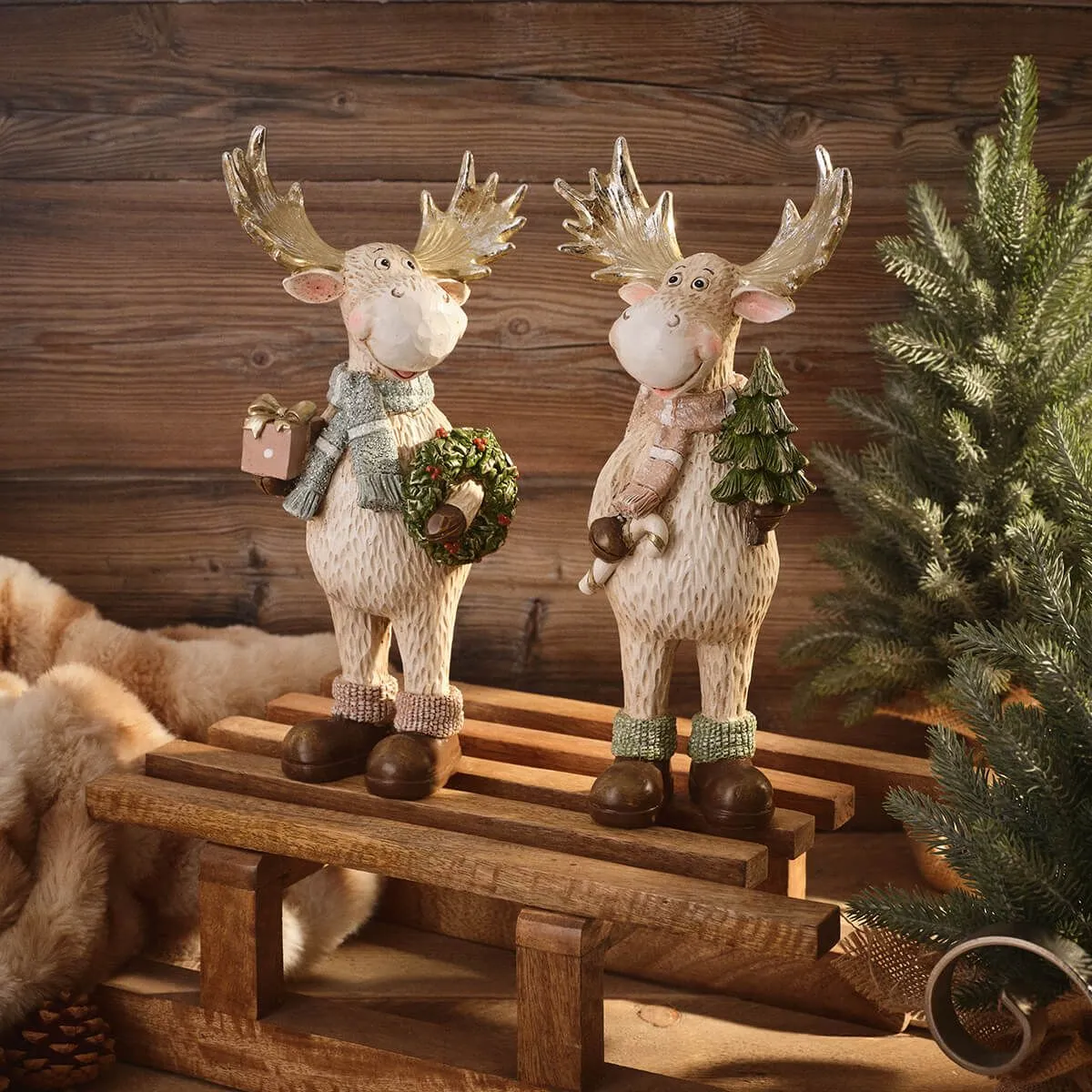 Nordic Nest standing moose resin Christmas ornaments with gold antlers and pastel scarves