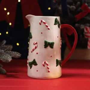 Merry Little Bows embossed ceramic Christmas tall jug with green bows and candy canes