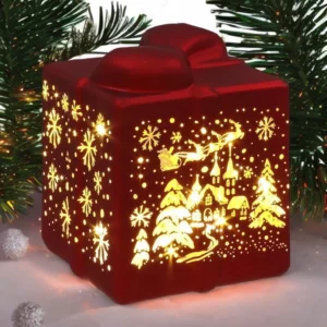 Bright Christmas LED present red ornament, festive illuminated decoration for Christmas trees and home decor.