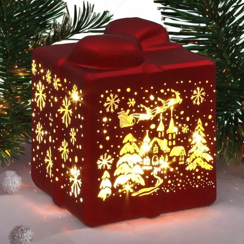 Bright Christmas LED present red ornament, festive illuminated decoration for Christmas trees and home decor.